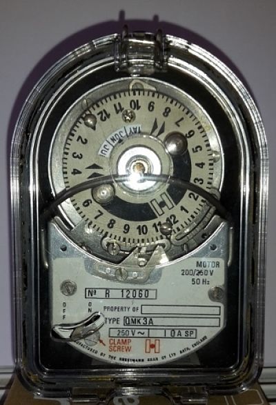 old electro mechanical edinburgh tenement stair light astro timer clock